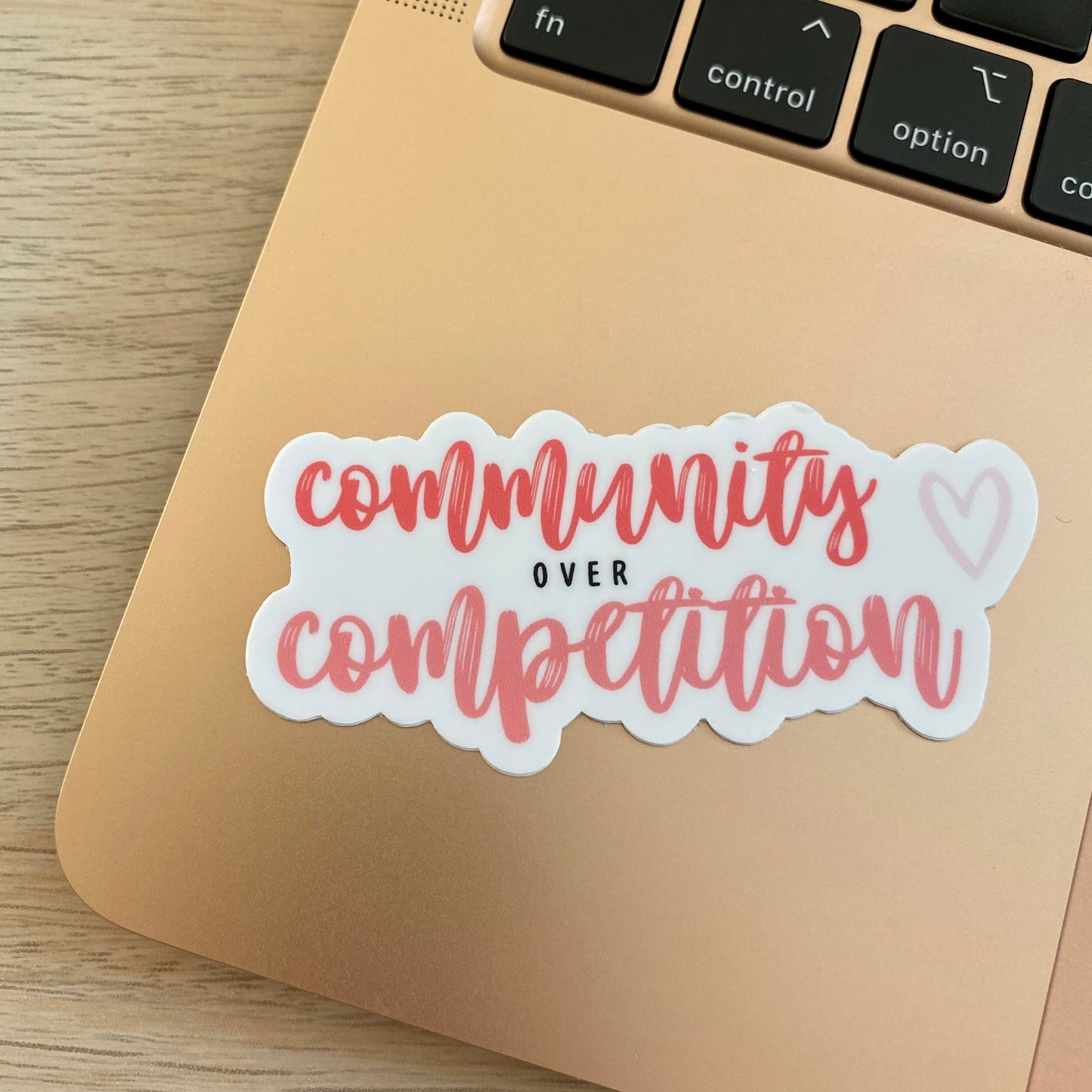 Community over Competition Sticker