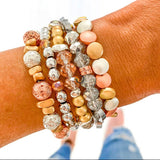 Mixed Metal Stack of Bracelets-Boldness with a Bun